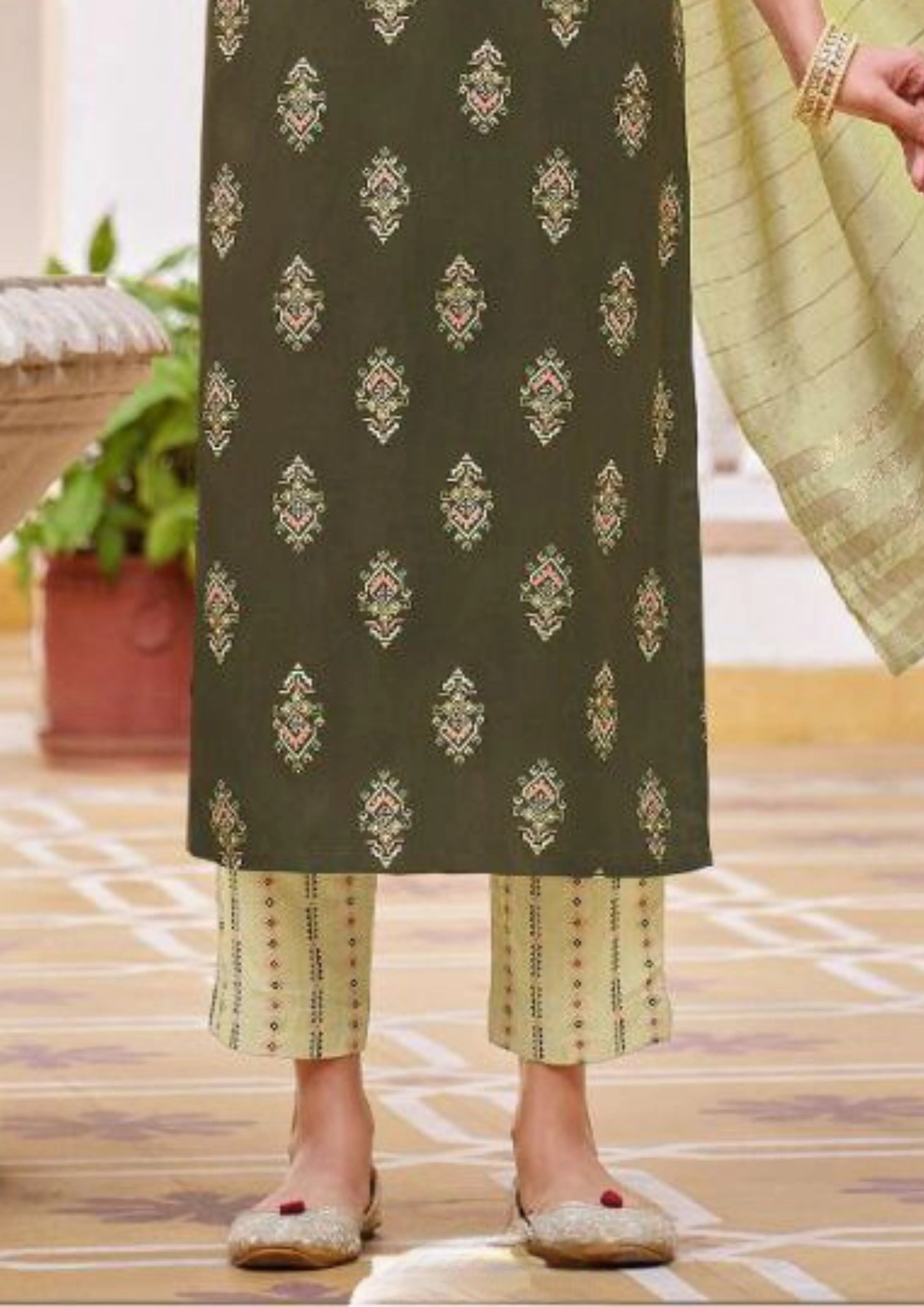 Wonderful Menendi Green color Rayon With Classy Gold Print Fancy Embroidery Work
